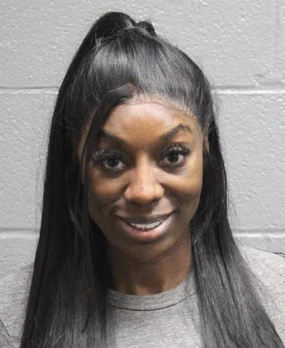RHOP star Dr. Wendy Osefo grins in mugshot as she and husband Eddie are arrested and jailed on fraud charges